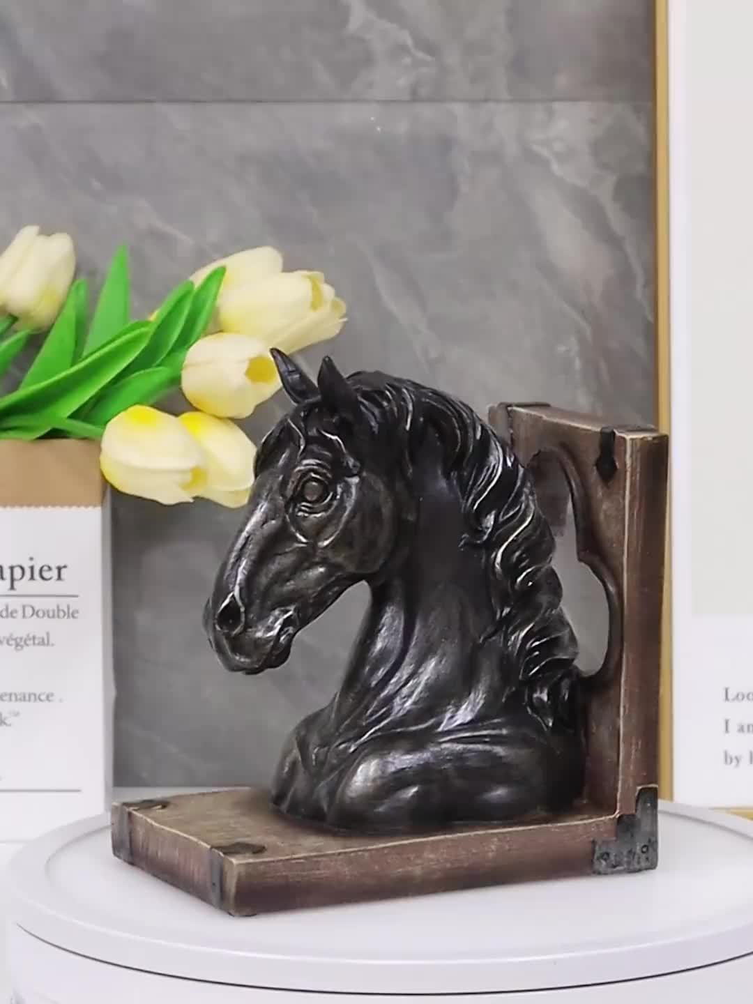 A Resin Bookend Shaped Like a Horse